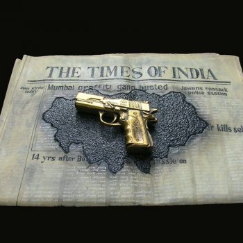 Newspaper and a gun - Kanta Kishore Moharana - statue