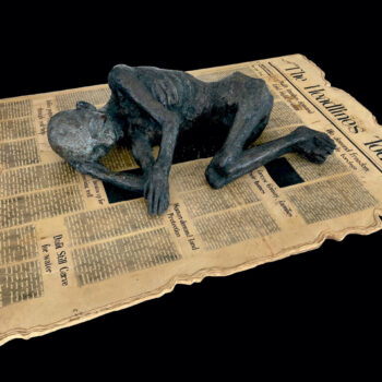 Newspaper and a sleeping man - Kanta Kishore Moharana - sculpture
