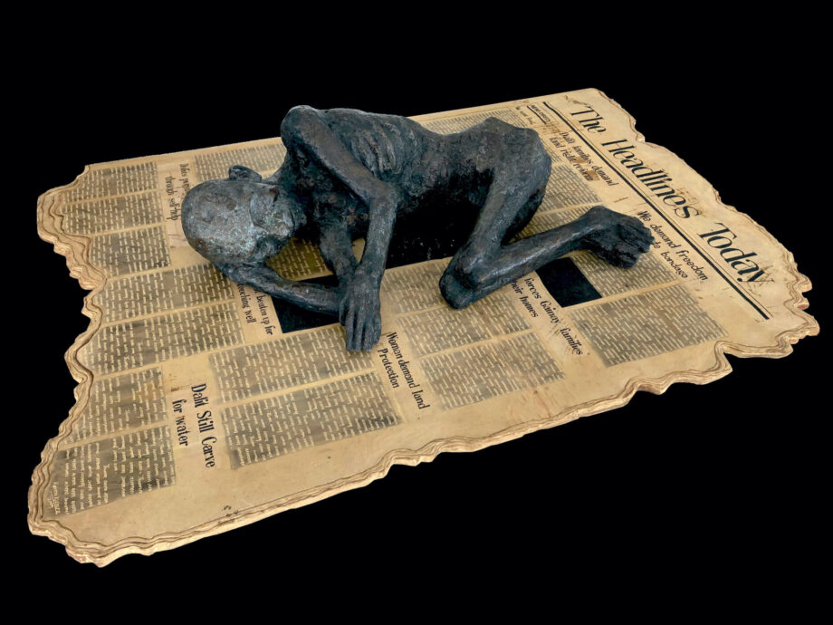 Newspaper and a sleeping man - Kanta Kishore Moharana - sculpture